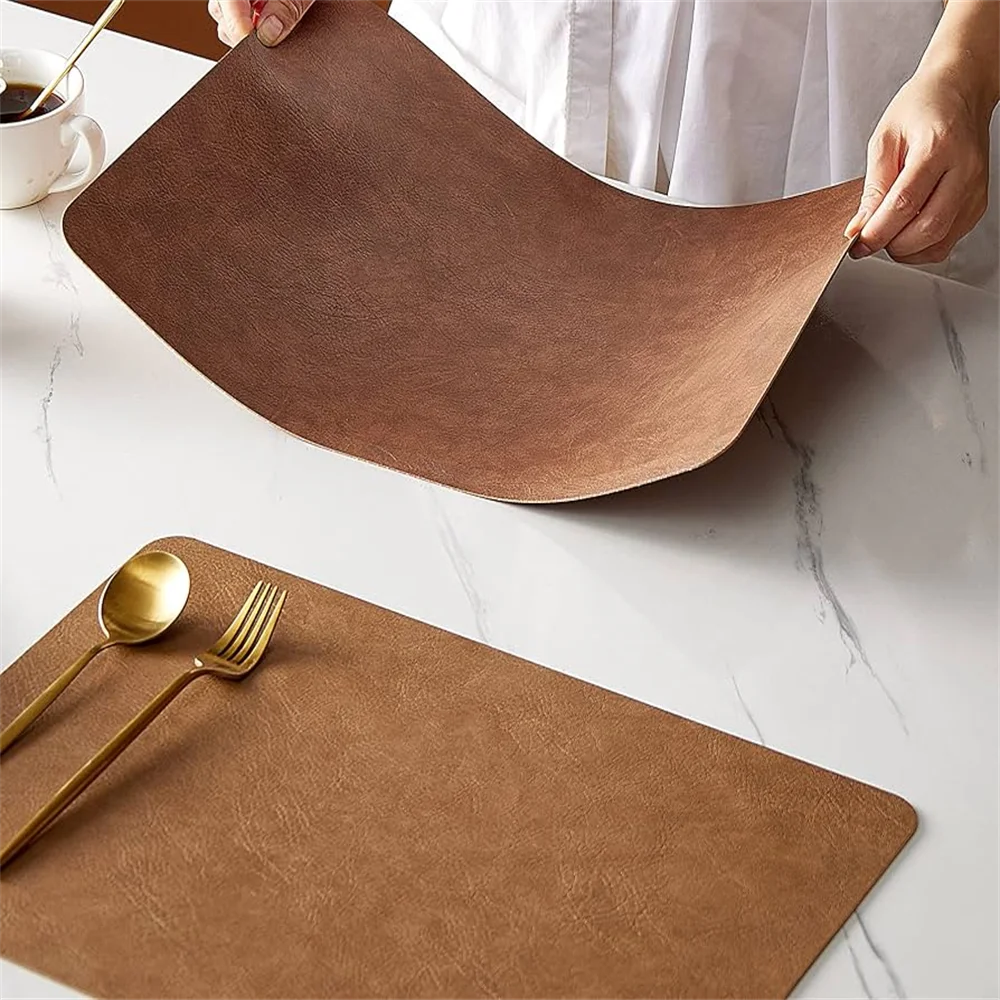 Saa84b1cb5fcb44a0abb00a495bfe4a98Z.webp Faux Leather Placemats Set of 1/4/6pcs ,Heat Resistant Non-Slip Waterproof,Double-Sides,Kitchen Dining PU Table Place Mats - Image 1